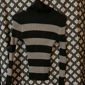 Striped turtle neck.